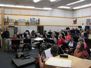 picture of the orchestra rehearsing